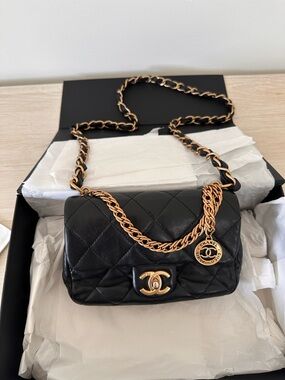 CHANEL Black Quilted Leather Crossbody with Gold Hardware